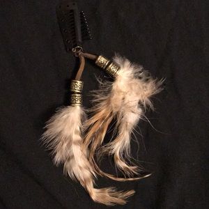 Feather hair clip.